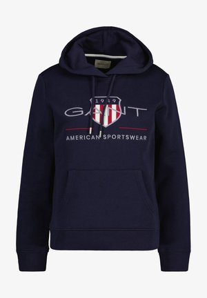 Marineblauwe hoodie van een katoenmix, met een voorzak, verstelbare trekkoordkap, en grafische logo met schildontwerp.