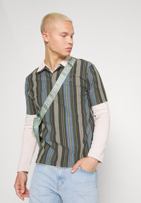 Levi's® 511 SLIM - Calças de ganga justas - medium indigo worn in