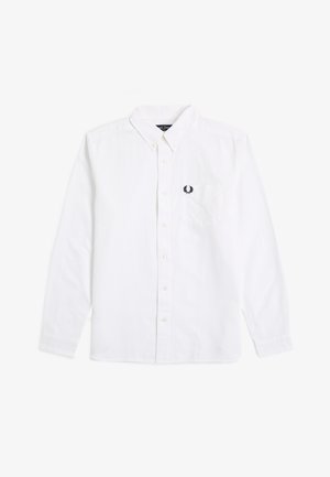 Chemise blanche à manches longues avec boutons-pression, col boutonné et petit logo de laurier noir brodé sur la poche poitrine gauche.