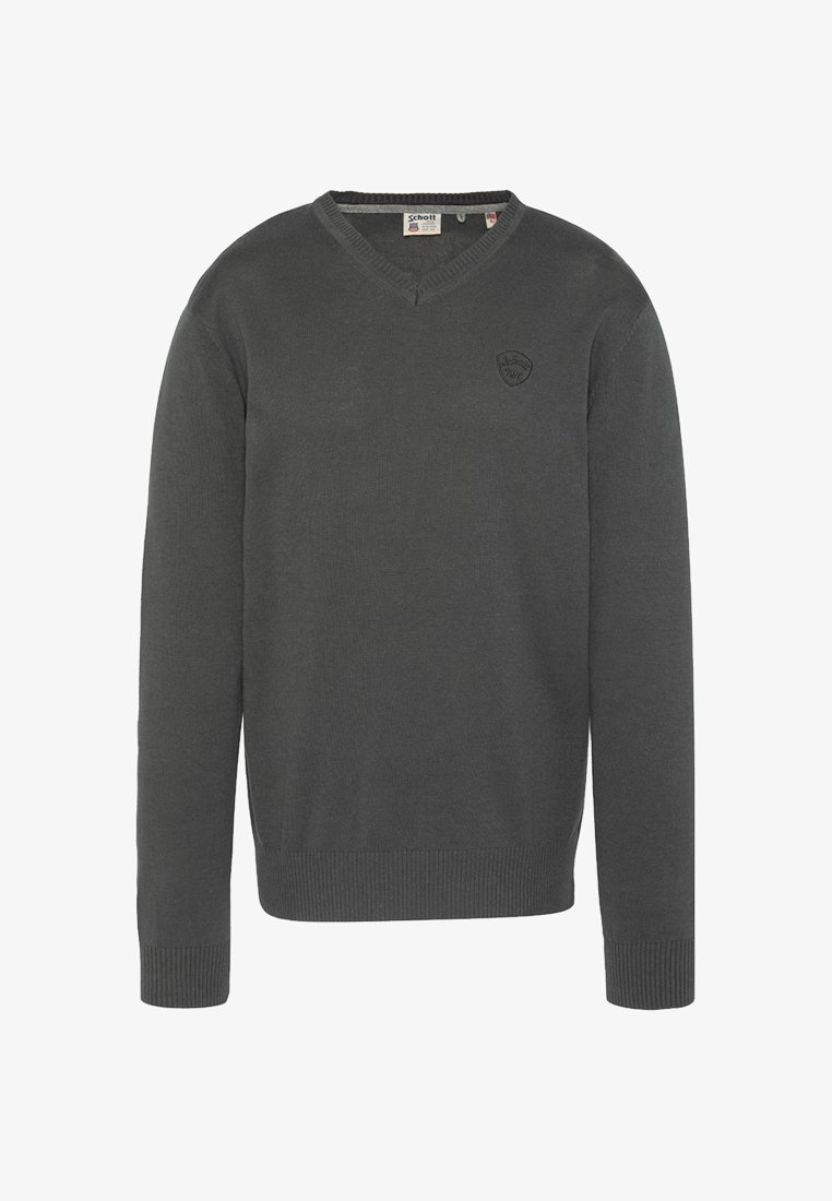 Ciemnoszary sweter na drutach z dekoltem w serek, długimi rękawami, ściągaczami na mankietach i dole. Posiada małą naszywkę z logo na górnej lewej stronie.