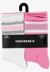 Calze crew in confezione da 6, disponibili nei colori rosa e bianco con strisce grigie. Ogni calza presenta la scritta "CONVERSE" stampata in modo prominente vicino al gambale.