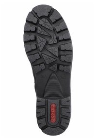 Semelle de chaussure en caoutchouc noir avec un design de semelle robuste aux motifs angulaires et un logo rouge. Comprend des indications de taille 37 et 5.
