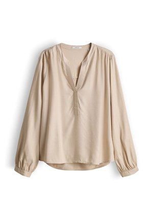 Beige blouse met een V-hals, lange mouwen en gerimpelde schouders. Gemaakt van gladde stof, met een knooploze voorkant en een afgeronde zoom.