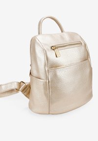 Bosanova CON CREMALLERAS - Mochila - oro