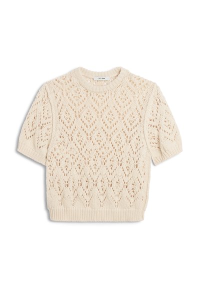 Pull tricoté à manches courtes de couleur crème avec un motif en dentelle en forme de losange et un col, des poignets et un ourlet côtelés.