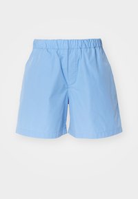 Shorts en coton bleu clair avec une taille élastique, dotés d'un design simple et de détails cousus discrets. Adaptés pour un usage décontracté.