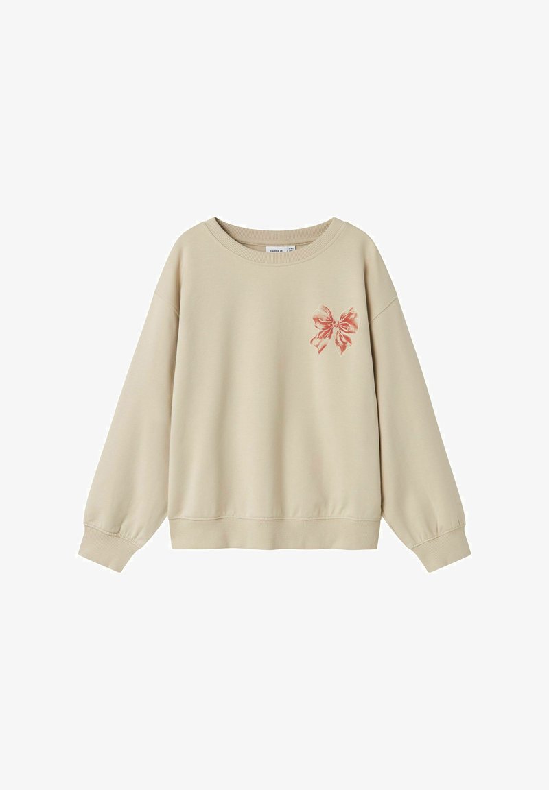 Felpa beige con maniche lunghe, polsini a costine e collo rotondo. Presenta una sottile stampa floreale rossa sul lato sinistro del petto. Tessuto morbido.