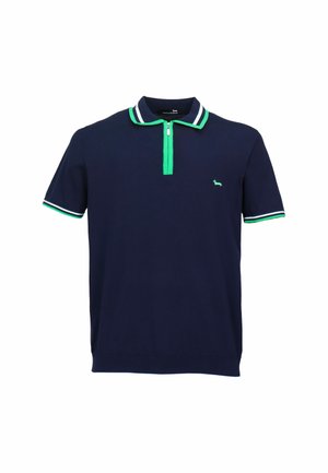 Polo a maniche corte blu navy con collo e polsini a righe verdi e bianche, patta con cerniera verde e piccolo logo di cane verde sul petto.