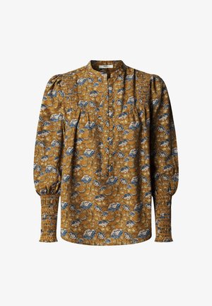 Bluse mit Blumenmuster in Senfgelb mit blauen und weißen Blumen. Verfügt über einen Mandarin-Kragen, Knopfleiste und geraffte Bündchen. Lange Ärmel.