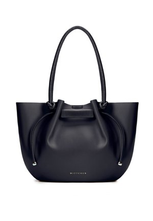 Sac cabas en cuir noir avec deux longues poignées, détails à cordon sur les côtés et petit nom de marque métallique "WITTCHEN" à l'avant.