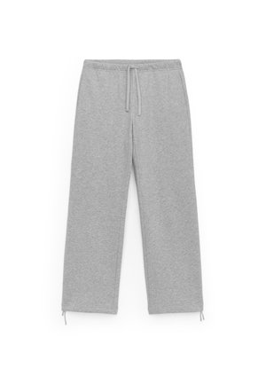 Graue Jogginghosen aus weichem Stoff, mit einem elastischen Bund und Kordelzug, geraden Beinen und dezenten Knöchelbindungen.