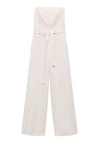 Jumpsuit sans manches en tissu blanc cassé avec une coupe à jambes larges. Doté d'une ceinture nouée à la taille et d'une texture lisse.