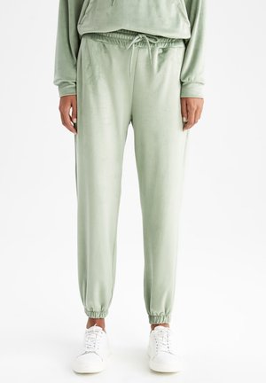 STANDART FIT - Tracksuit bottoms - green