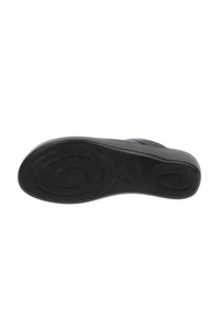 Suola di scarpa nera con superficie in gomma texturizzata, caratterizzata da motivi circolari e ovali e un arco pronunciato per la stabilità.