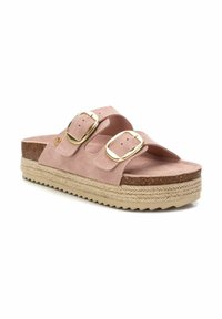 Sandali slide in suede rosa con due fibbie dorate regolabili, soletta in sughero e suola piatta avvolta in juta con bordo a zigzag.