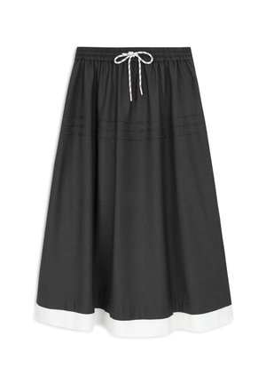 Jupe grise avec un ourlet blanc, en tissu léger. Taille élastique avec cordon de serrage et détail de couture décoratif.