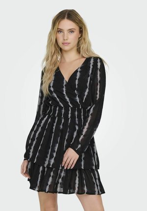 Schwarzes, gestuftes Kleid mit V-Ausschnitt, langen Ärmeln und gerafftem Bund. Verfügt über ein Batikmuster mit grauen und weißen Streifen. Leichter Stoff.