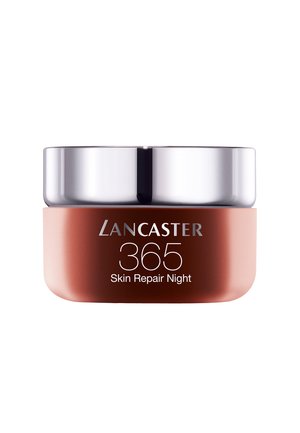 Lancaster 365 Skin Repair nattkräm i en rund glasburk med ett metallock. Burken har en varm, rosaguld nyans och en slät yta.