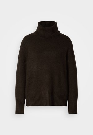 Tamsiai rudas modelis su apvalia apykakle, pagamintas iš struktūruoto mezginio, su laisvu siluetu ir banguotomis rankogaliais bei apatine dalimi.