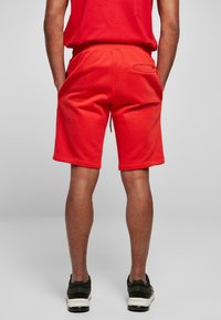 Starter ESSENTIAL - Tepláky - cityred