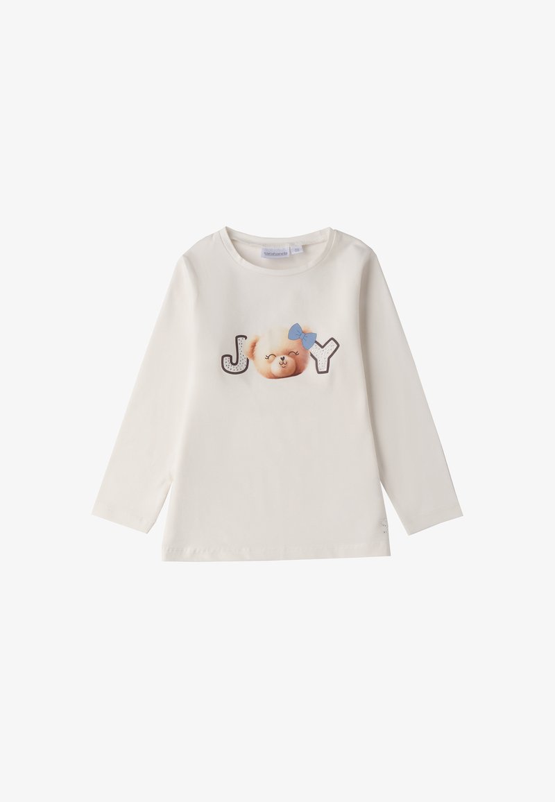 Langärmliges T-Shirt in Creme mit bedrucktem Bärenkopf, blauer Schleife und "JOY"-Schriftzug in Grau und Schwarz. Glattes Baumwollmaterial, runder Ausschnitt.