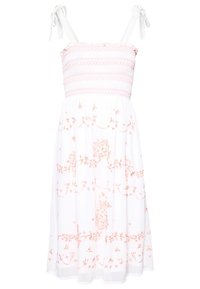 Robe midi blanche avec broderie florale rose, corsage smocké et bretelles à nouer aux épaules.