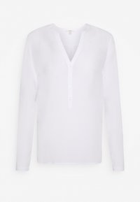 Camicia bianca a maniche lunghe con scollo a V, dotata di cinque bottoni frontali e di un tessuto liscio e leggero. Design semplice e classico.