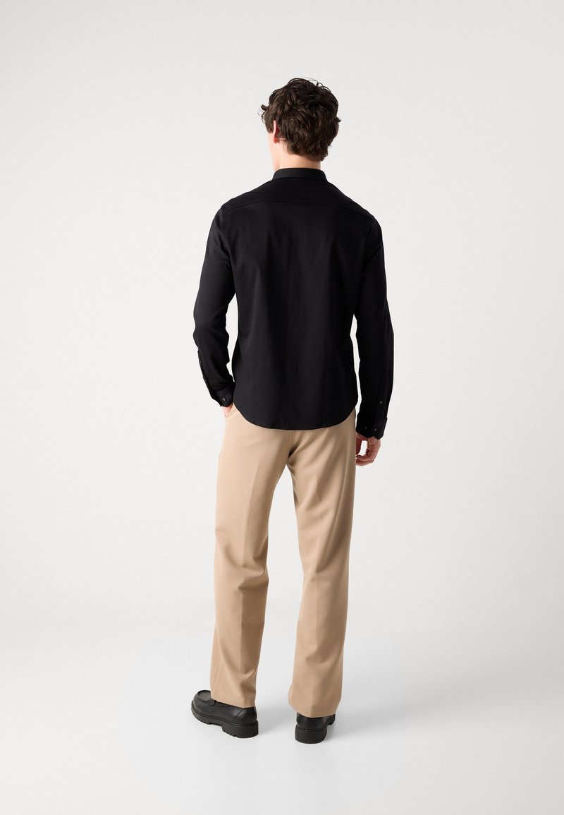 BOSS Shirt - black - (Pre-owned) - Zalando.ie BOSS Shirt - black - (Pre-owned) - Zalando.ie