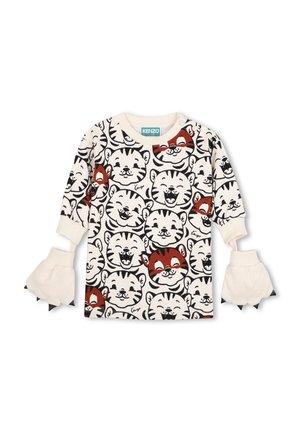 Chemise enfant crème à manches longues avec imprimé de visages de tigres souriants noirs et marron et gants crème attachés avec bouts de griffes noirs.