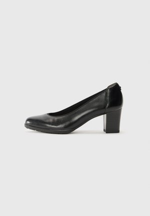 Scarpa nera con tacco alto, punta arrotondata, tomaia in pelle liscia, suola texturizzata e tacco a blocco largo. Design classico adatto per abbigliamento formale.