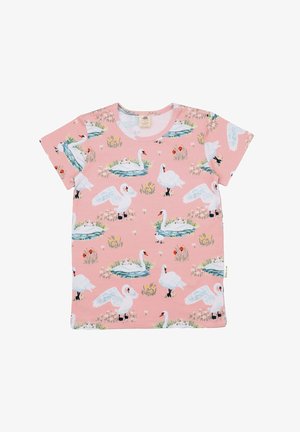 Pink short-sleeve t-shirt featuring white swans in various poses, surrounded by green grass and flowers, made from soft cotton material.