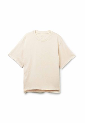 T-shirt à manches courtes de couleur crème en tissu doux, avec un col rond, une coupe décontractée et un ourlet droit avec des détails de couture minimalistes.