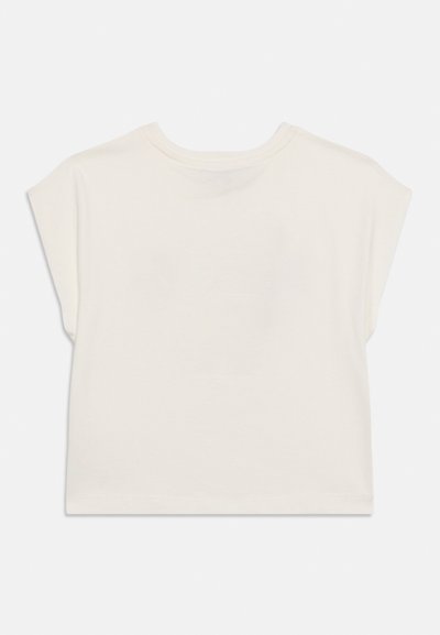 T-shirt court à manches courtes, coupe ample, écru, court, avec un col rond, présenté à plat sur un fond clair.