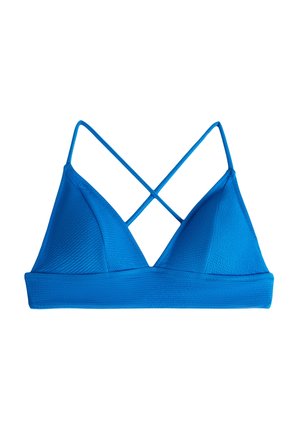 Sininen kolmio-bralette, jossa on ristikkäiset hihnat. Valmistettu teksturoidusta kankaasta, jossa on saumaton vyötärö ja sileä pinta keskellä.