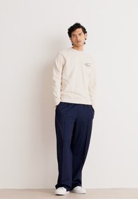 Tommy Jeans ENTRY GRAPHIC CREW - Felpa - beige/sand