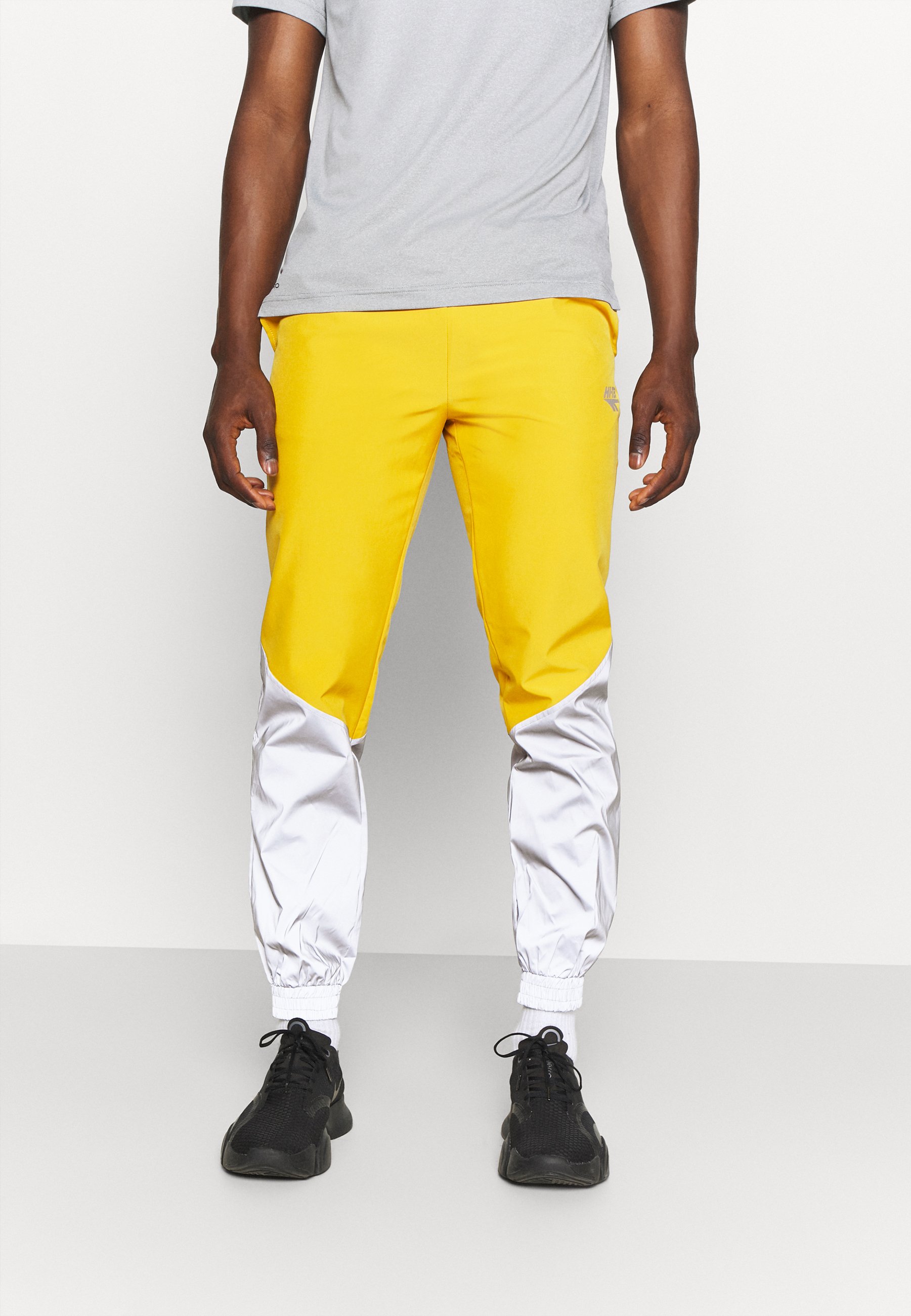 track pants yellow