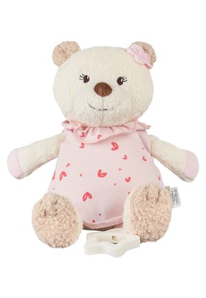 Plush teddy bear with cream-colored fur, wearing pink dress with red hearts, a matching bow on ear, and a white star-shaped teething toy.