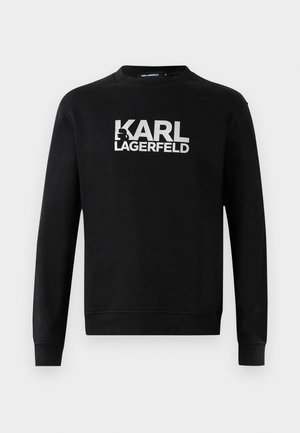 Sudadera negra de manga larga con el logo blanco "KARL LAGERFELD" y un gráfico estilizado del perfil en el pecho, cuello redondo, puños y dobladillo acanalados.