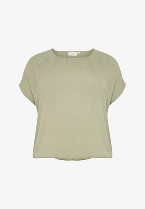 Bluză scurtă cu mânecă scurtă, de culoare verde deschis, cu decolteu rotund și croială lejeră. Textură moale cu detalii subtile de pliu în față.