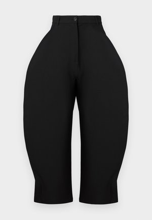 Schwarze Hosen mit einem hoch geschnittenen Design und weiten, zulaufenden Beinen. Hergestellt aus glattem Stoff, mit einem Knopfverschluss und ohne sichtbare Taschen.