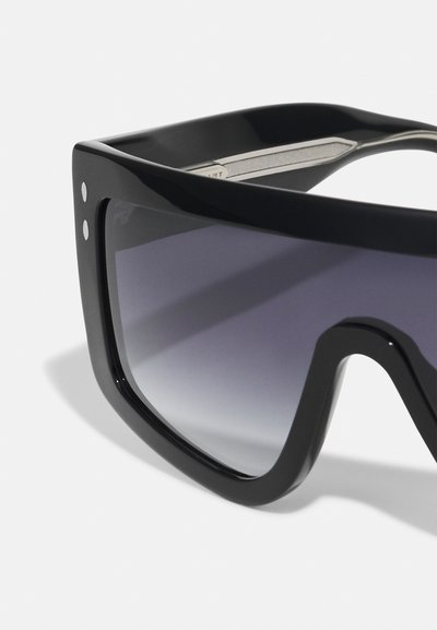 Black oversized sunglasses with a thick frame, gradient purple lenses, and subtle metal accents. Features a geometric design and smooth texture.