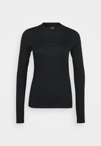 Svart langermet skjorte laget av et strukturert strikket stoff. Har rund halslinning og subtil logo på brystet. Elegant og tettsittende design.