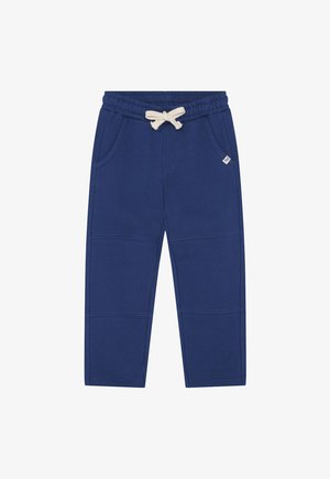 Pantalones deportivos azul marino con cintura ajustable con cordón, bolsillos laterales y color sólido. Elaborados con tela suave y texturizada con detalles de costuras visibles.