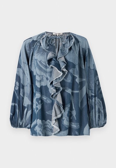 Blue floral blouse featuring ruffled neck detail, long sleeves, and textured fabric. The design includes various shades of blue and subtle patterns.
