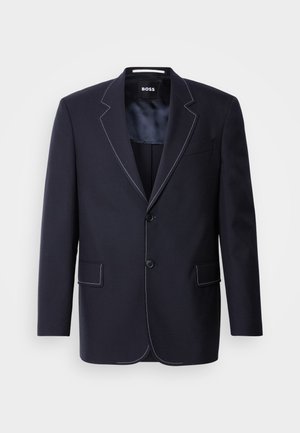 Navy blazer made of fabric, featuring contrasting white stitching along the lapels and edges, with two front pockets and a single button closure.