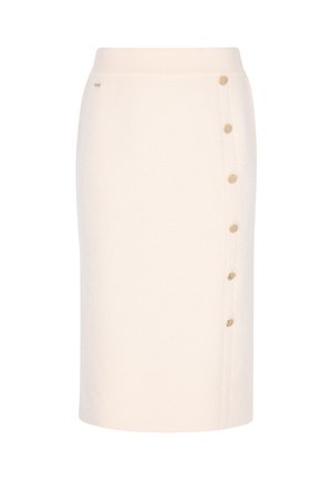 Neulepencilhame vaaleassa beessissä, joka on istuva, ja jossa on ribbivyötärö sekä sivupainonappi kultaisilla yksityiskohdilla.