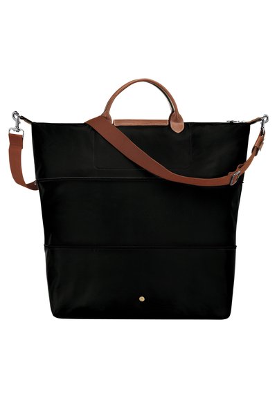 Schwarze Nylon-Handtasche mit braunen Lederakzenten, ausgestattet mit zwei Griffen und einem abnehmbaren Schultergurt; umfasst eine Fronttasche und goldene Nietenverzierungen.