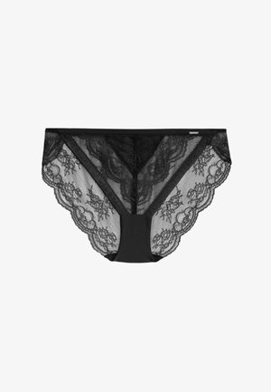 Culotte en dentelle noire présentant un corps en mesh, des bords festonnés et des détails en dentelle florale, avec une taille lisse et le nom de la marque imprimé.