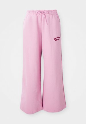 Pantalones de chándal de un suave color rosa claro, confeccionados en una tela suave, con un diseño de pierna ancha, cinturilla elástica con cordón y detalle del logotipo bordado.