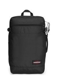 Black backpack made of durable fabric, featuring a front zippered pocket, top handle, and branded patch. Rectangular design with minimalistic style.